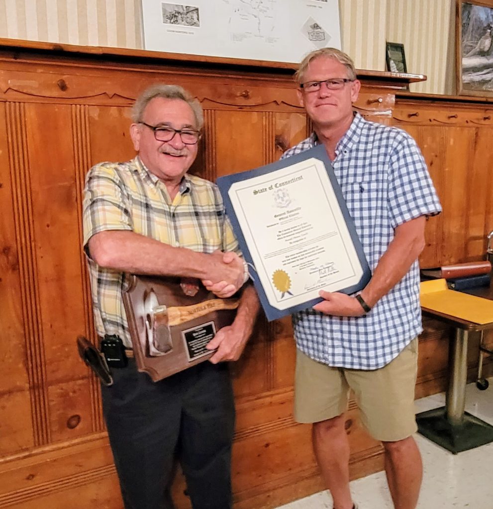 Senator Witkos (Right) presents Norfolk Vol. Fire Department member Ron Zanobi with a citation in recognition of 50 years of service.  